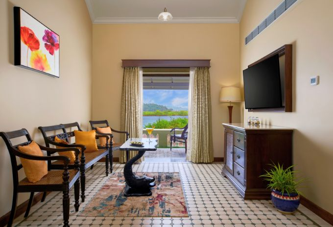 Elegantly furnished living room in the Maharani Suite at Mercure Devaaya Resort Goa