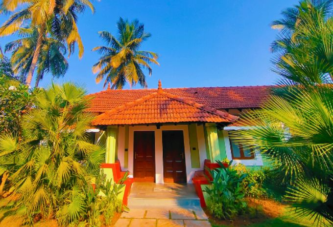 Waterfront villa with private veranda overlooking the Mandovi River at Mercure Goa Devaaya Resort